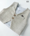 beige merino wool vest with a small check pattern.jpg
