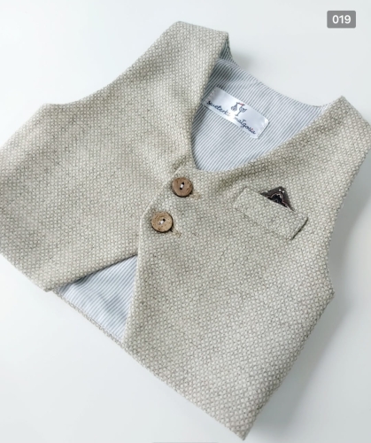 beige merino wool vest with a small check pattern.jpg