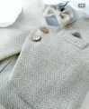 beige merino wool vest with a small check pattern.jpg