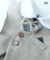 beige merino wool vest with a small check pattern.jpg