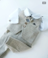 beige merino wool vest with a small check pattern.jpg