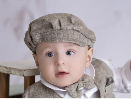 Beige linen herringbone cappuccino for summer, for baptism, for a boy, with a visor.png