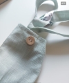 mint pastel linen christening pants for one year old with suspenders and coconut buttons (2).jpg