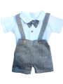 a baptism set for a boy in a beige herringbone pattern, shorts with suspenders with buttons and a bow tie