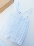 Linen baptism shorts with suspenders for a boy with pleats