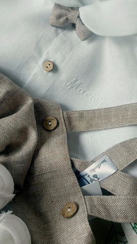 Baptism set for a boy in a beige herringbone pattern, shorts with suspenders and buttons, and a bow tie.jpg